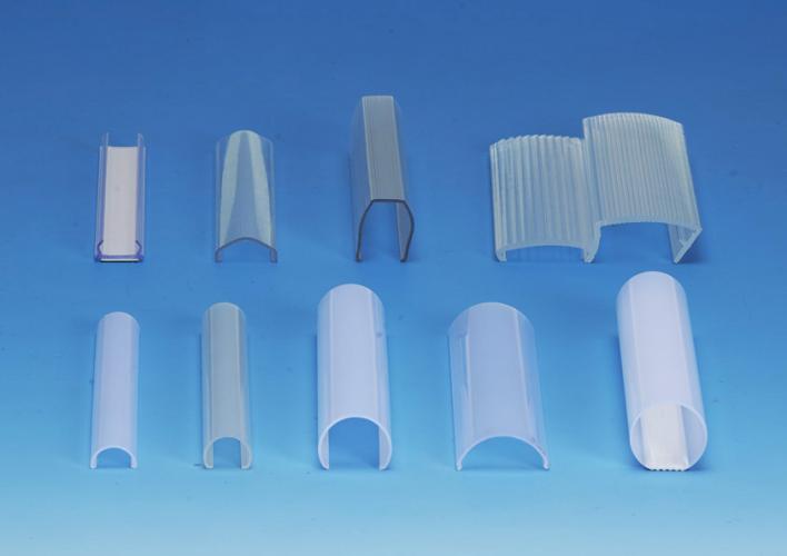 Plastic shaped extrusion and related products